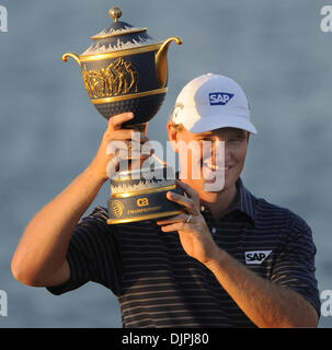 Mar. 14, 2010 - Doral, FL - Florida, USA - United States - Doral---fl-doral-golf-0314a----Action from the final round of the CA Championship at the Doral Golf Resort and Spa.   Champion Ernie Els, of South Africa, smiles as he holds up the championship trophy.         Robert Duyos,  Sun Sentinel (Credit Image: © Sun-Sentinel/ZUMApress.com) Stock Photo
