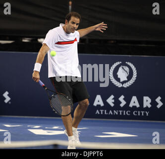 Apr 10, 2010 - Atlantic City , New Jersey , USA - PETE SAMPRAS returns a serve action in the 3rd Match. Andy Roddick went on to win the 3rd match in the Caesars Tennis Classic at Historic Boardwalk Hall  in Atlantic City NJ on Saturday April 10, 2010.      (Credit Image: © Tom Briglia/ZUMA Press) Stock Photo