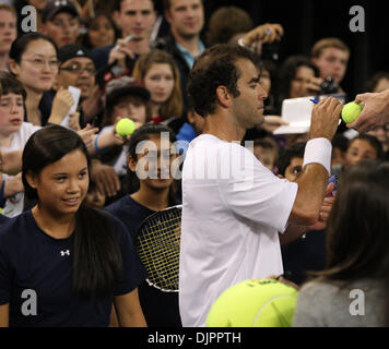 Apr 10, 2010 - Atlantic City , New Jersey , USA - PETE SAMPRAS signs a few autographs for fans after his match. Andy Roddick went on to win the 3rd match in the Caesars Tennis Classic at Historic Boardwalk Hall  in Atlantic City NJ on Saturday April 10, 2010.   (Credit Image: © Tom Briglia/ZUMA Press) Stock Photo