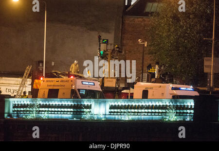 Glasgow, Scotland, UK. 30th November 2013. Police helicopter crashes in to the Clutha pub in Glasgow the Eurocopter EC135 T2 - with a crew of three consisting of two police officers and a civilian pilot - came down on the roof of a packed pub in Stockwell Street at 10.25pm in Glasgow, United Kingdom. Credit:  Sam Kovak/Alamy Live News Stock Photo