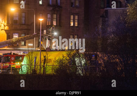 Glasgow, Scotland, UK. 30th November 2013. Police helicopter crashes in to the Clutha pub in Glasgow the Eurocopter EC135 T2 - with a crew of three consisting of two police officers and a civilian pilot - came down on the roof of a packed pub in Stockwell Street at 10.25pm in Glasgow, United Kingdom. Credit:  Sam Kovak/Alamy Live News Stock Photo