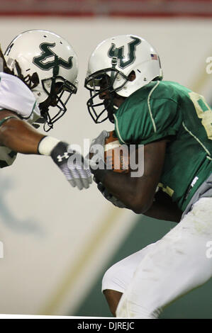 Apr. 17, 2010 - Tampa, Florida, U.S - 17 April 2010: Team South Florida wide receiver Dontavia Bogan (#81) catches a touchdown pass.  Team South Florida defeated Team Bulls  52-31 as USF played their spring football game at Raymond James Stadium in Tampa, Florida (Credit Image: © Margaret Bowles/Southcreek Global/ZUMApress.com) Stock Photo