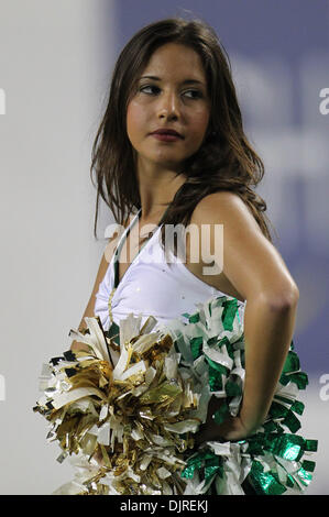 Apr. 17, 2010 - Tampa, Florida, U.S - 17 April 2010: A USF cheerleader takes a break.  Team South Florida defeated Team Bulls  52-31 as USF played their spring football game at Raymond James Stadium in Tampa, Florida (Credit Image: © Margaret Bowles/Southcreek Global/ZUMApress.com) Stock Photo