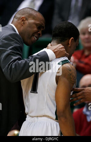 UAB head coach Mike Davis yells from the sideline as his team plays ...