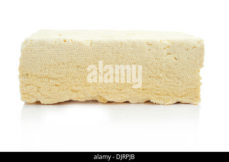 a block of tofu on a white background Stock Photo