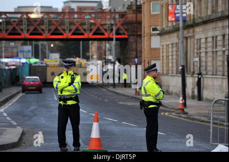 Glasgow, Scotland, UK. 30th November 2013. Police and rescue services at the Clutha Bar, Stockwell Street, Glasgow, as recovery opertation contiues following a police helicopter crashed into the roof of the pub Credit:  Tony Clerkson/Alamy Live News Stock Photo