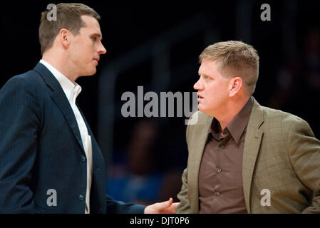 Mar. 19, 2010 - Los Angeles, California, U.S - 19 March 2010:  Flash Assistant Coach Mark Madsen, former world champion with the Los Angeles Lakers, refrains Flash Head Coach Brad Jones after Jones received a technical foul in the firsy half. The Utah Flash defeated the Los Angeles D-Fenders 128-107 at Staples Center in Los Angeles, CA.Mandatory Credit - Andrew Fielding / Southcree Stock Photo