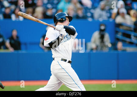 Apr. 15, 2010 - Toronto, Ontario, Canada - 15 April 2010 Toronto, Ontario:  Toronto Blue Jays left fielder Travis Snider #45 takes one to deep centre field for the first home run of the evening against the Chicago White Sox on Thursday at Rogers Centre in Toronto, Ontario. (Credit Image: © Darren Eagles/Southcreek Global/ZUMApress.com) Stock Photo