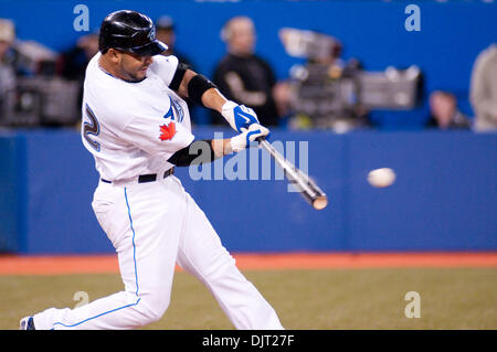 Apr. 15, 2010 - Toronto, Ontario, Canada - 15 April 2010 Toronto, Ontario:  Toronto Blue Jays shortstop Alex Gonzalez #11 gets a base hit in the eighth inning against the Chicago White Sox, Thursday night at Rogers Centre in Toronto, Ontario.  The Toronto Blue Jays defeated the Chicago White Sox by a score of 7-3. (Credit Image: © Darren Eagles/Southcreek Global/ZUMApress.com) Stock Photo