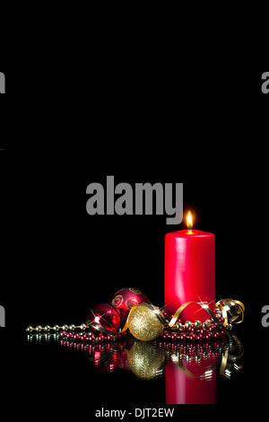 Christmas card picture - red candle and decorations Stock Photo