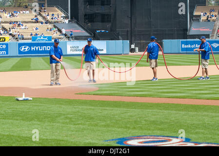 Apr. 17, 2010 - Los Angeles, California, U.S - 17 April 2010:  Dodgers ground crew members water the field before the game. The Los Angeles Dodgers were shutout by the San Francisco Giants, 9-0, at Dodger Stadium in  Los Angeles, California. .Mandatory Credit: Andrew Fielding / Southcreek Global (Credit Image: © Andrew Fielding/Southcreek Global/ZUMApress.com) Stock Photo