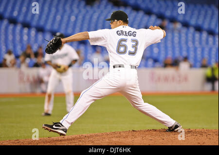 Apr. 13, 2010 - Toronto, Ontario, Canada - 13 April 2010: Toronto Blue Jays relief pitcher Kevin Gregg (63) is seen closing the game in the 9th inning. The Blue Jays defeated the White Sox 4-2 at the Rogers Centre in Toronto, Ontario. (Credit Image: © Adrian Gauthier/Southcreek Global/ZUMApress.com) Stock Photo