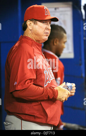 Apr. 18, 2010 - Toronto, Ontario, Canada - 18 April 2010: Los Angeles Angels manager Mike Sciosia is seen in the dugout looking on prior to the start of the game.  The Angels defeated the Blue Jays 3-1 at the Rogers Centre in Toronto, Ontario. (Credit Image: © Adrian Gauthier/Southcreek Global/ZUMApress.com) Stock Photo