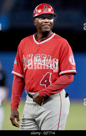 Apr. 18, 2010 - Toronto, Ontario, Canada - 18 April 2010: Los Angeles first base coach Alfredo Griffin is seen smiling while looking into the crowd. The Angels defeated the Blue Jays 3-1 at the Rogers Centre in Toronto, Ontario. (Credit Image: © Adrian Gauthier/Southcreek Global/ZUMApress.com) Stock Photo