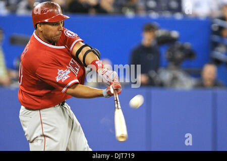 Apr. 18, 2010 - Toronto, Ontario, Canada - 18 April 2010: Los Angeles Angels left fielder Juan Rivera (20) is seen swinging during action against the Toronto Blue Jays. The Angels defeated the Blue Jays 3-1 at the Rogers Centre in Toronto, Ontario. (Credit Image: © Adrian Gauthier/Southcreek Global/ZUMApress.com) Stock Photo