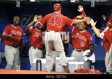 Apr. 18, 2010 - Toronto, Ontario, Canada - 18 April 2010: Los Angeles Angels catcher Mike Napoli (44) is seen being congratulated by teammates after scoring a run in 9th inning against the Toronto Blue Jays. The Angels defeated the Blue Jays 3-1 at the Rogers Centre in Toronto, Ontario. (Credit Image: © Adrian Gauthier/Southcreek Global/ZUMApress.com) Stock Photo