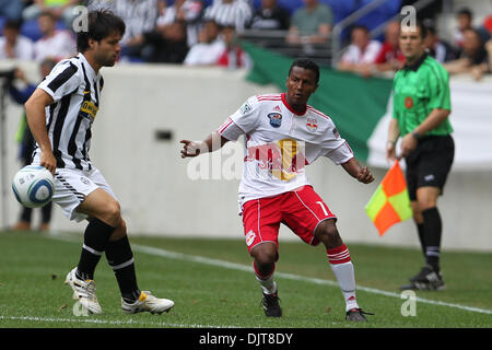 Juventus Midfielder Diego (#28) stands helpless as Red Bulls Defender Danleigh Borman (#11) sends the ball off. The Red Bulls defeated Juventus 3-2  in the game held at Red Bull Arena, Harrison, NJ. (Credit Image: © Anthony Gruppuso/Southcreek Global/ZUMApress.com) Stock Photo