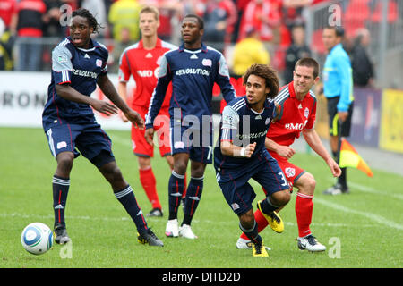 Toronto FC forward Sam Cronin (2) and New England Revolution defender Kevin Alston (30) chase after the ball at BMO Field in Toronto, Ontario. (Credit Image: © Anson Hung/Southcreek Global/ZUMApress.com) Stock Photo