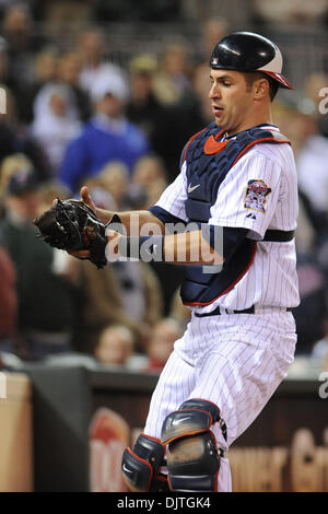 Joe Mauer doubles, catches in Twins finale