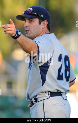 St. Thomas University Bobcats Head Coach Jorge Perez (28) signals for bullpen. The 14th ranked Miami Hurricanes defeated the St. Thomas University Bobcats 9-6 at Alex Rodriguez Park in Coral Gables, Florida. (Credit Image: © Ron Hurst/Southcreek Global/ZUMApress.com) Stock Photo