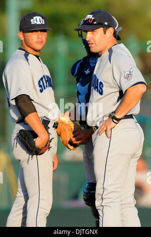 St. Thomas University Bobcats Head Coach Jorge Perez (28) removes starting pitcher Michael Arostegui. The 14th ranked Miami Hurricanes defeated the St. Thomas University Bobcats 9-6 at Alex Rodriguez Park in Coral Gables, Florida. (Credit Image: © Ron Hurst/Southcreek Global/ZUMApress.com) Stock Photo