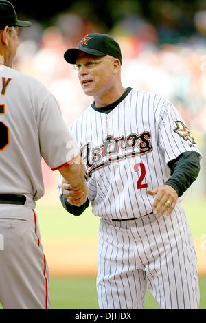 Astros new manager Brad Mills (2) gets introduced and shakes hands with the Giants manager Bruce Bochy (15). The San Francisco Giants beat the Astros in their home opener 5 - 2 at Minute Maid Park in Houston Texas. (Credit Image: © Luis Leyva/Southcreek Global/ZUMApress.com) Stock Photo