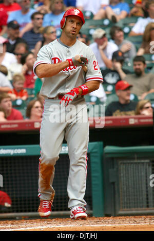 Philadelphia Phillies left fielder Raul Ibanez warms up at Coors