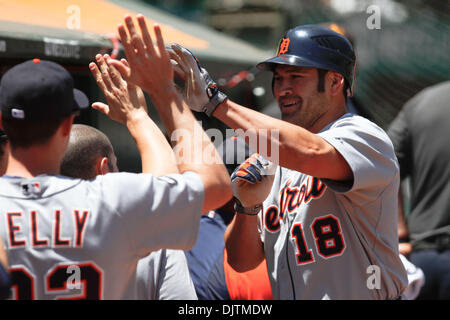 20-MAY-2010: Oakland, CA:   Oakland Athletics Hosts the Detroit Tigers.  Detroit Tigers left fielder Johnny Damon (18) congratulates his team mates after he scores a run against the Oakland Athletics.  The Tigers win the game 5-2. (Credit Image: © Dinno Kovic/Southcreek Global/ZUMApress.com) Stock Photo