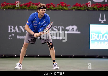 Mardy FISH (USA) blue shirt and Novak DJOKOVIC (SRB) black shirt  - at the 2010 BNP Paribas Open held at the Indian Wells Tennis Garden in Indian Wells, California. Djokovic (SRB) defeated Fish (USA) 6-1, 0-6, 6-2. (Credit Image: © Gerry Maceda/Southcreek Global/ZUMApress.com) Stock Photo