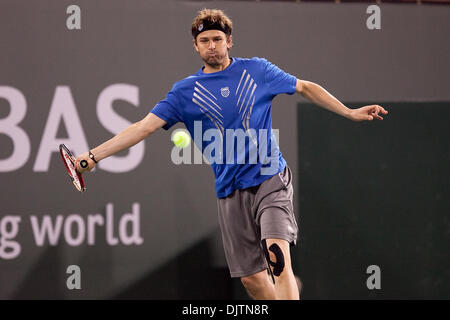 Mardy FISH (USA) blue shirt and Novak DJOKOVIC (SRB) black shirt  - at the 2010 BNP Paribas Open held at the Indian Wells Tennis Garden in Indian Wells, California. Djokovic (SRB) defeated Fish (USA) 6-1, 0-6, 6-2. (Credit Image: © Gerry Maceda/Southcreek Global/ZUMApress.com) Stock Photo