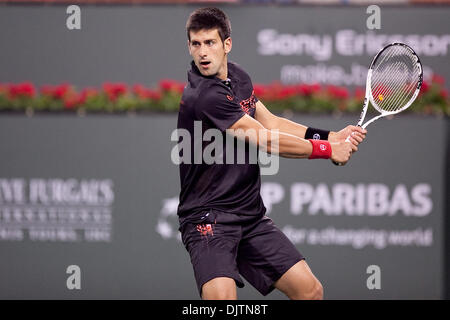 Mardy FISH (USA) blue shirt and Novak DJOKOVIC (SRB) black shirt  - at the 2010 BNP Paribas Open held at the Indian Wells Tennis Garden in Indian Wells, California. Djokovic (SRB) defeated Fish (USA) 6-1, 0-6, 6-2. (Credit Image: © Gerry Maceda/Southcreek Global/ZUMApress.com) Stock Photo