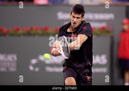 Mardy FISH (USA) blue shirt and Novak DJOKOVIC (SRB) black shirt  - at the 2010 BNP Paribas Open held at the Indian Wells Tennis Garden in Indian Wells, California. Djokovic (SRB) defeated Fish (USA) 6-1, 0-6, 6-2. (Credit Image: © Gerry Maceda/Southcreek Global/ZUMApress.com) Stock Photo