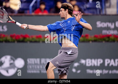 Mardy FISH (USA) blue shirt and Novak DJOKOVIC (SRB) black shirt  - at the 2010 BNP Paribas Open held at the Indian Wells Tennis Garden in Indian Wells, California. Djokovic (SRB) defeated Fish (USA) 6-1, 0-6, 6-2. (Credit Image: © Gerry Maceda/Southcreek Global/ZUMApress.com) Stock Photo