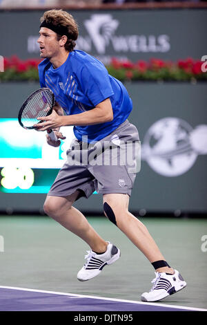 Mardy FISH (USA) blue shirt and Novak DJOKOVIC (SRB) black shirt  - at the 2010 BNP Paribas Open held at the Indian Wells Tennis Garden in Indian Wells, California. Djokovic (SRB) defeated Fish (USA) 6-1, 0-6, 6-2. (Credit Image: © Gerry Maceda/Southcreek Global/ZUMApress.com) Stock Photo