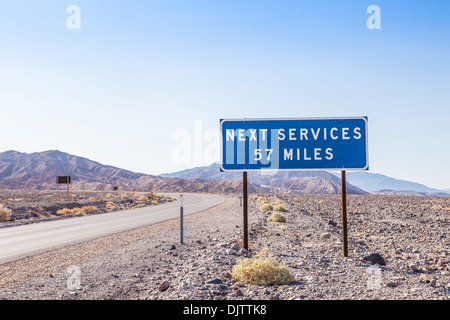 Death Valley, USA. Next service streetsight useful for travel concept Stock Photo