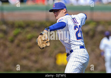 Chicago Cubs second baseman Jeff Baker (28) throws to first for an out during the game between the Houston Astros and Chicago Cubs at Wrigley Field in Chicago, Illinois. (Credit Image: © John Rowland/Southcreek Global/ZUMApress.com) Stock Photo