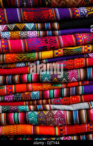 Local carpets made of llama and alpaca wool for sale at the market, Cuzco, Peru. Stock Photo