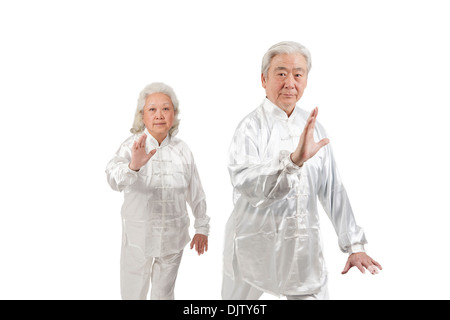 Two senior people doing Tai Chi Stock Photo