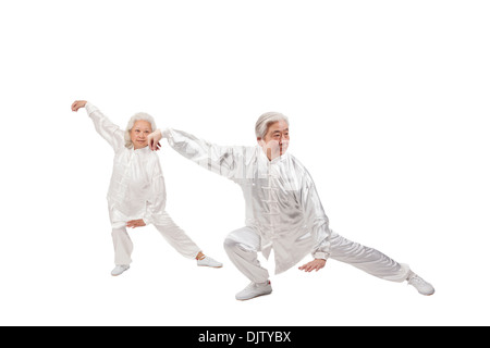Two senior people doing Tai Chi Stock Photo