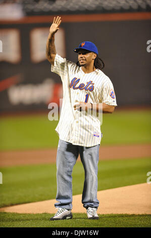 Wearing a New York Mets jersey, New York Jets first round draft