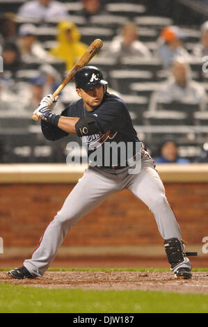 20 April, 2010: Atlanta Braves second baseman Martin Prado (14) throws to  first during MLB action between the Mets and Braves at Citi Field in  Flushing, N.Y. . The Mets won 1-0