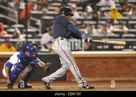 20 April, 2010: Atlanta Braves third baseman Chipper Jones (10) swings during MLB action between the Mets and Braves at Citi Field in Flushing, N.Y. . The Mets won 1-0 in five innings after rain forced the end of the game. (Credit Image: © Will Schneekloth/Southcreek Global/ZUMApress.com) Stock Photo