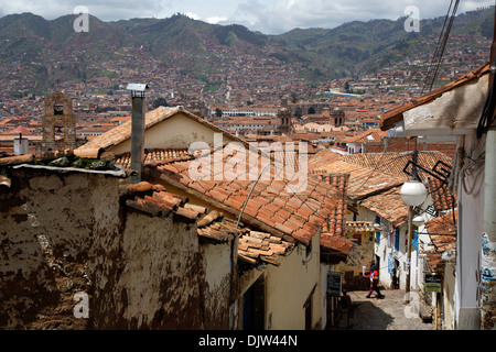 Street scene in San Blas neighborhood with a view over the rooftops of Cuzco, Peru. Stock Photo