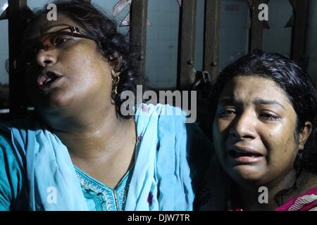 Relative of businessman Habibur Rahman, 30, cries in front of the morgue in Dhaka Medical College Hospital, after he was killed when a bus lost control after a petrol bomb attack and ran over a rickshaw carrying him, during a Bangladesh Nationalist Party (BNP)-led 72 hours nationwide protest in Dhaka November 30, 2013. At least one person was killed and five others injured in the incident, local media reported. Stock Photo