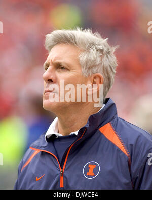 Illinois football coach Ron Zook paces between rows of players during ...