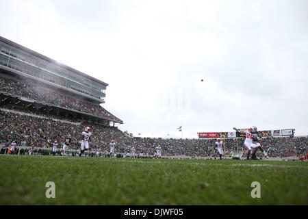 Oct. 2, 2010 - East Lansing, Michigan, United States of America - Wisconsin Badgers Niles Brinkley looks to make a catch during the game against the Michigan State Spartans at Spartan Stadium. (Credit Image: © Rey Del Rio/Southcreek Global/ZUMApress.com) Stock Photo