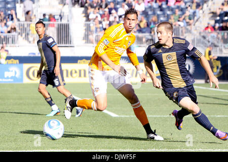 Oct. 2, 2010 - Chester, Pennsylvania, United States of America - Houston Dynamo midfielder Geoff Cameron (#20) and Philadelphia Union defender Jordan Harvey (#2) go after the ball during the match at PPL Park in Chester, PA. The teams tied 1-1, dashing any playoffs hopes for the Union. (Credit Image: © Kate McGovern/Southcreek Global/ZUMApress.com) Stock Photo