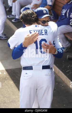 Oct. 3, 2010 - Los Angeles, California, United States of America - Los Angeles Dodgers manager Joe Torre (6) shares a hug with Los Angeles Dodgers right fielder Andre Ethier (16) prior to the start of the game between the Los Angeles Dodgers and the Arizona Diamondbacks.  The game would be the final game of the 2010 season, and Torre's final game as Manager of the Los Angeles Dodge Stock Photo