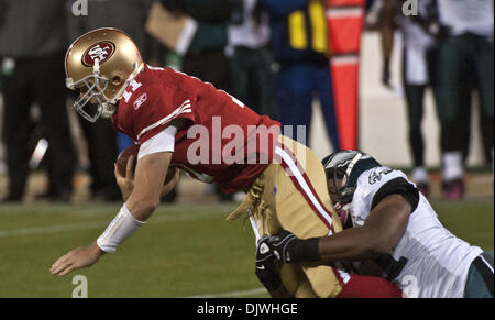 Philadelphia Eagles wide receiver Jason Avant (81) is hit by Buffalo Bills  safety Jim Leonard on the Philadelphia 48-yard line as he completes a  23-yard pass during second quarter in Philadelphia at