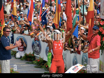 Oct 9, 2010 - Big Island, Hawaii, U.S. - Professional athlete CHRIS McCORMACK salutes the energetic crowd after crossing the finish line in victory at the Ford Ironman World Championships from Kailua-Kona. (Credit Image: © L.E. Baskow/ZUMApress.com) Stock Photo